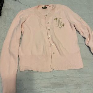 Wicked Glinda Pink Pearl-Button Cardigan Sweater by Paul Tazewell